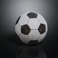 Classic Black And White Soccer Ball With Textured Surface On Dark Reflective Background