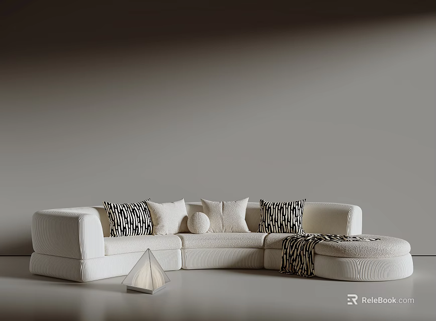 Modern Irregular Shaped White Sofa With Patterned Pillows And Knitted Throw 3d model 