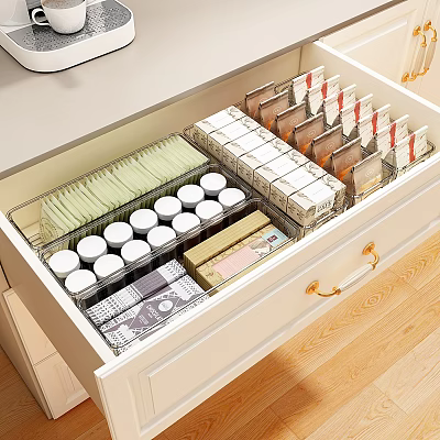 Organized Wooden Kitchen Drawer with Neatly Arranged Spices Herb Packets and Condiment Boxes 3d model