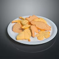 Assorted Shaped Cookies On White Plate With Leaf Flower And Animal Designs