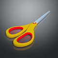 Yellow Scissors With Red Grip Handles And Shiny Metal Blades On Dark Surface