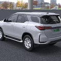 White Toyota SUV Featuring Modern Front Grille And Sleek Body Design