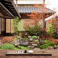 Traditional Japanese Courtyard Garden With Red Maple Tree Stone Lantern And Water Feature