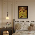 Double Bed with Black Bedframe Beige Walls Nightstand Vase Flowers Table Lamp and Wall Painting