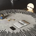 Open Book With Eyeglasses Mobile Phone On Round Black Striped Decorative Rug