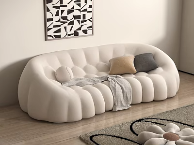 Beige Curved Double Sofa With Petal Shaped Design Cushions Throw Blanket And Geometric Wall Art 3d model