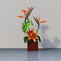 Elegant Bonsai Plant With Orange Flowers And Green Leaves In Wooden Pot On Light Surface
