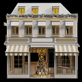 Christmas Decorated Shop Exterior Building With Striped Awning White Shutters And Festive Lights