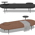Modern Gray And Brown Ottoman With Round Cushion Plaid Blanket And Metal Legs Design