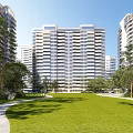 Modern High Rise Residential Building With Green Lawn And Trees Around