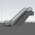 Modern Escalator with Metal Handrails and Yellow Striped Steps Against Sunset Sky