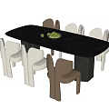 Black Rectangular Dining Table With Beige And Brown Chairs And Green Fruits Plate