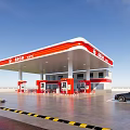 SUMOIL Gas Station Exterior With Red And White Canopy And Fuel Pumps
