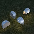 Modern Silver Half Moon Shaped Outdoor Lights Illuminated On Green Grass Area