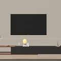 Modern TV Stand In Living Room With Wall Mounted TV And Decorative Accents