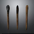 Wood And Stone Decorative Sculptures With Different Top Finishes On Dark Background