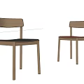 Simple Design Wooden Dining Chairs With Black Brown Seats And Green Plant In Light Space