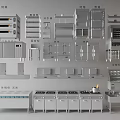 Various Commercial Kitchen Equipment With Ovens Shelves Stoves Cabinets And Worktables