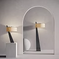 Modern Lamp Combination With Black Base Beige Lampshade Grey Wall Arch Mirror And White Pedestal