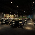 Modern Restaurant Interior With Wooden Tables Soft Lighting And Green Plants