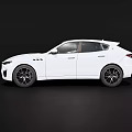 White Maserati SUV With Sleek Sporty Exterior And Black Alloy Wheels