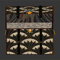 Open Ornate Trunk With Fan Shaped Pattern Gold Accents And Interior Lining