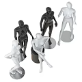 Multiple White And Black Mannequins In Standing And Sitting Poses