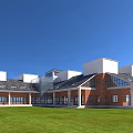 Modern Detached Villa With Red Brick Exterior White Roof Large Windows And Green Lawn