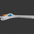 Adjustable Wrench With Orange Jaw Blue Spring White Handle And Reflection On Dark Surface