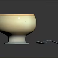 Creamy Yellow Pudding Dessert Topped with Black Seeds in White Bowl and Spoon
