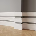 Modern Interior Corner With White And Gray Baseboard Molding Herringbone Wooden Flooring And Decorative Trim