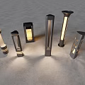 Various Modern Outdoor Lights With Metal Frames And Glass Panels Illuminated For Garden Pathway Use
