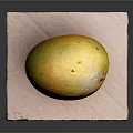Juicy Ripe Yellow Mango Placed On Pink Mat Against Dark Background