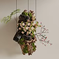 Natural Hanging Art Installation with Wood Stones Moss Pink Flowers Green Ferns and Red Berries