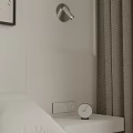 Modern White Bedroom Bedside Table With Clock And Curtains Near Wall