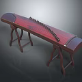Traditional Chinese Guzheng Wooden Musical Instrument With Red Strings And Stand On Dark Background