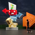 Urban Square Featuring Colorful Directional Arrows Signage And Pedestrian Walking