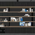 Modern Bookcase With Gray And Wooden Shelves Holding Books And Decorative Items
