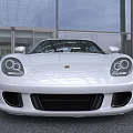 White Sports Car With Sleek Design On Road