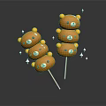 Yellow Bear Head Shaped Sweet Treats Skewered on Sticks with Star Decorations