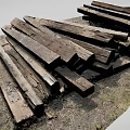 Vintage Car Wooden Components Lying On Ground With Weathered Surfaces And Various Lengths