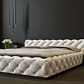 Luxurious Tufted White Double Bed with Dark Wall Hanging Pendant Lights and Bedside Vase