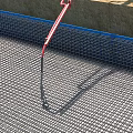 School Building Construction Site Featuring Steel Mesh And Blue Edge Design