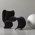 Modern Curved Black Single Sofa Interior Design With White Sphere Decoration