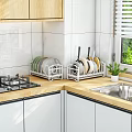 Modern Kitchen Interior With White Dish Racks Holding Plates And Spatulas On Wooden Countertop