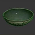 Elegant Vintage Metal Bowl With Intricate Carved Patterns And Blueish Interior Design