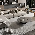 Light Beige Sofa and Round Coffee Table Set with Colorful Cushions Bookshelf and Striped Rug