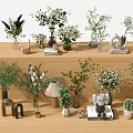 Various Decorative Vases With Greenery And White Flowers On Wooden Shelf With Small Decor Items