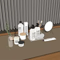 Stylish Bathroom Accessories With Bottles Mirror Organizer And Green Plant On Countertop
