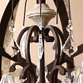 Decorative Spherical Chandelier With Crossed Metal Frame And Illuminated Bulbs Design
